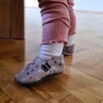 Toddler in barefoot slippers